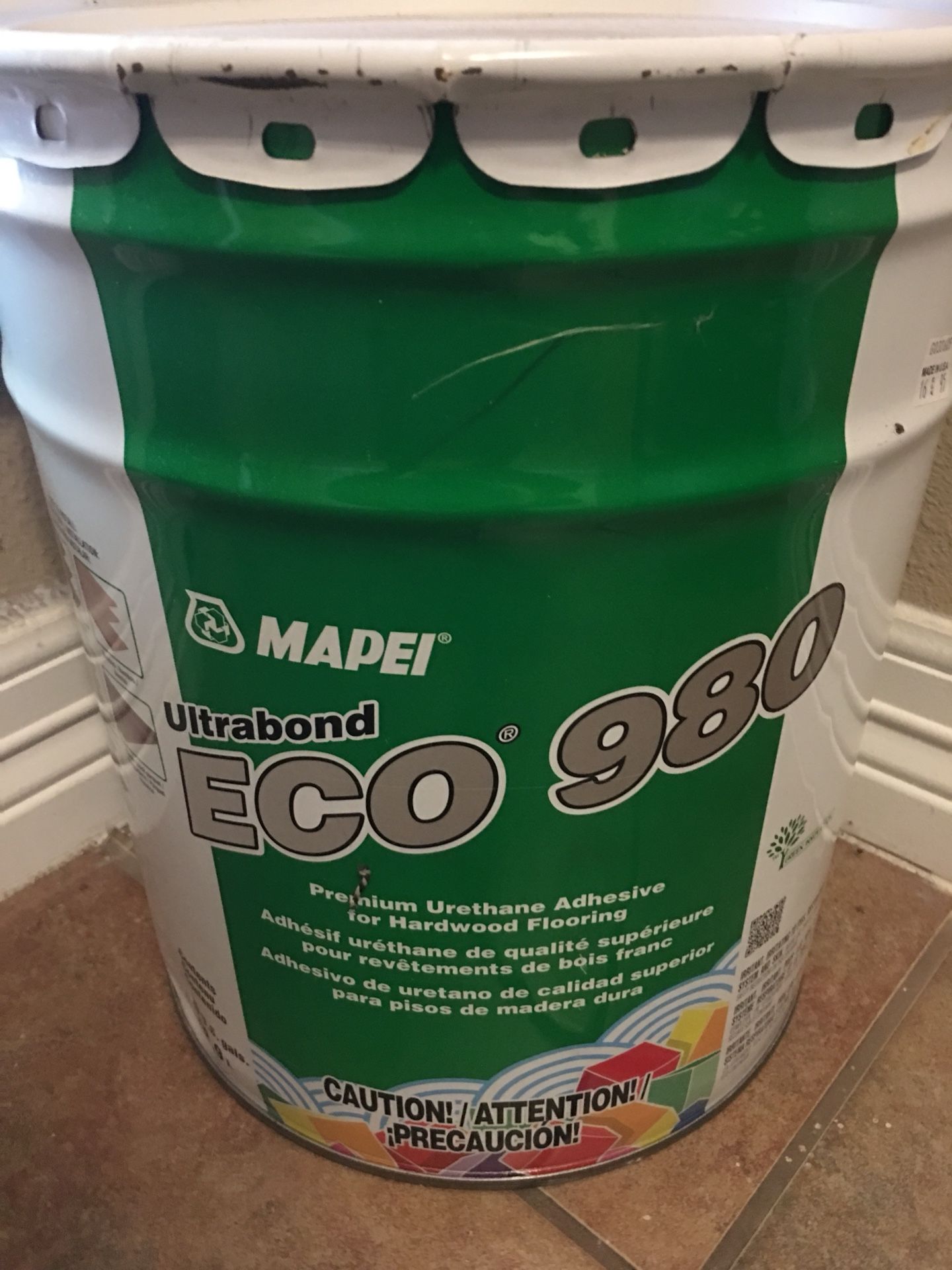 Mapei Ultrabond ECO 980 Adhesive 5 gallons. Never opened.