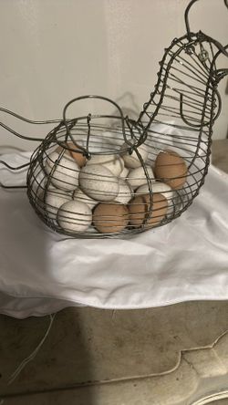 Wire Basket With 18 Ceramic Eggs.
