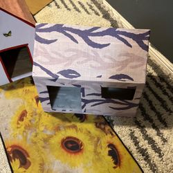 Casita para perros o gatos de cartón son chicas