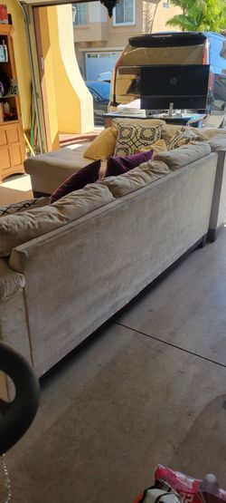 Queen size 2 piece sofa hide a bed.