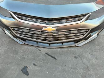 2016-2018 Chevrolet Malibu front bumper with all the accessories OEM.