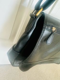 Genuine Leather - very nice quality -  Adjustable shoulder Strap