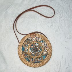 Circular woven crossbody bag