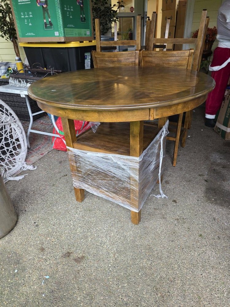 Bar Height Table - 4 Leather Chairs