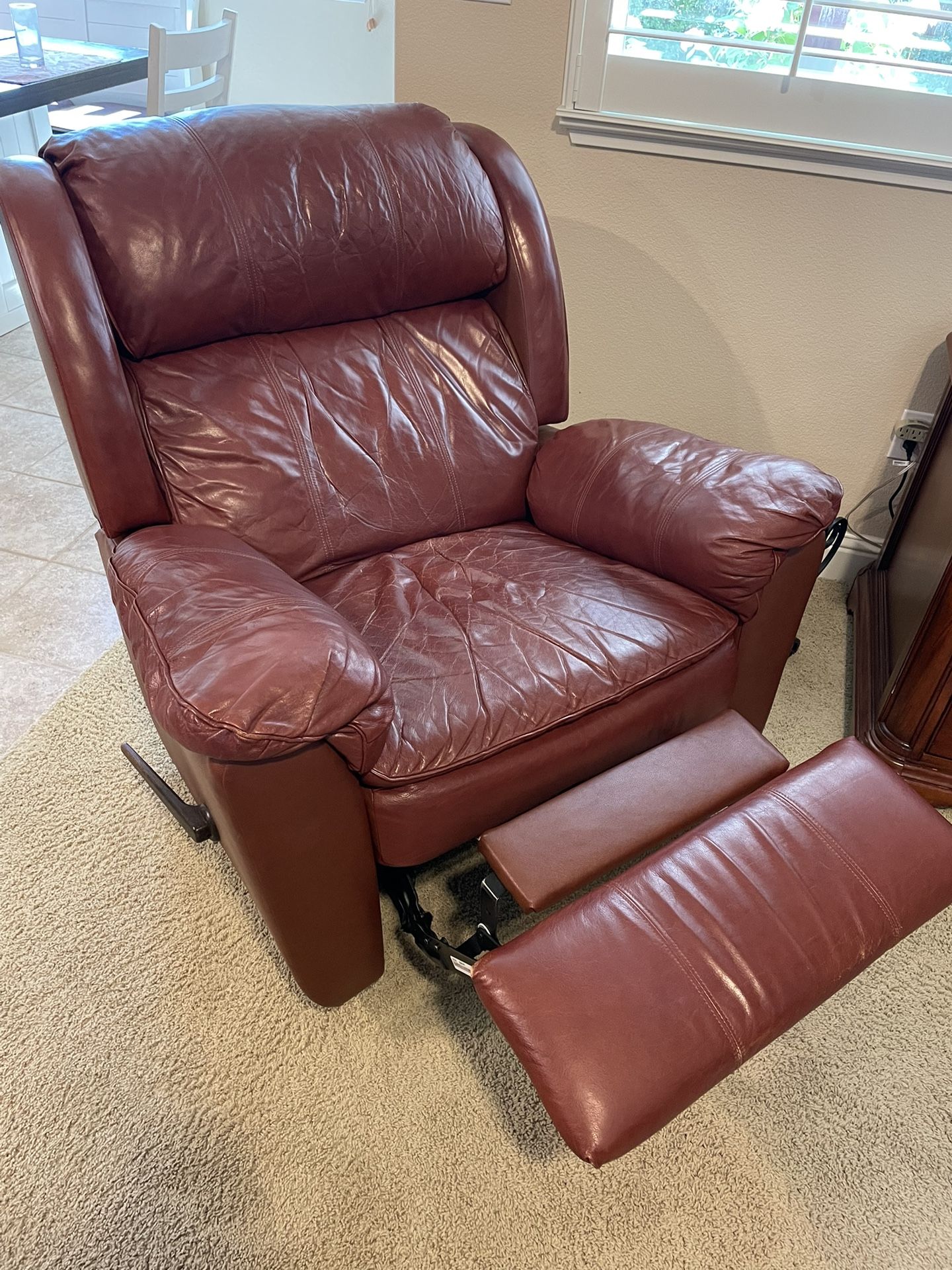 Free brown leather chair, recliner
