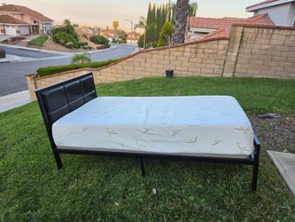 Twin size bed,  black metal