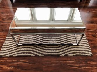 Mirrored coffee table with beveled edges