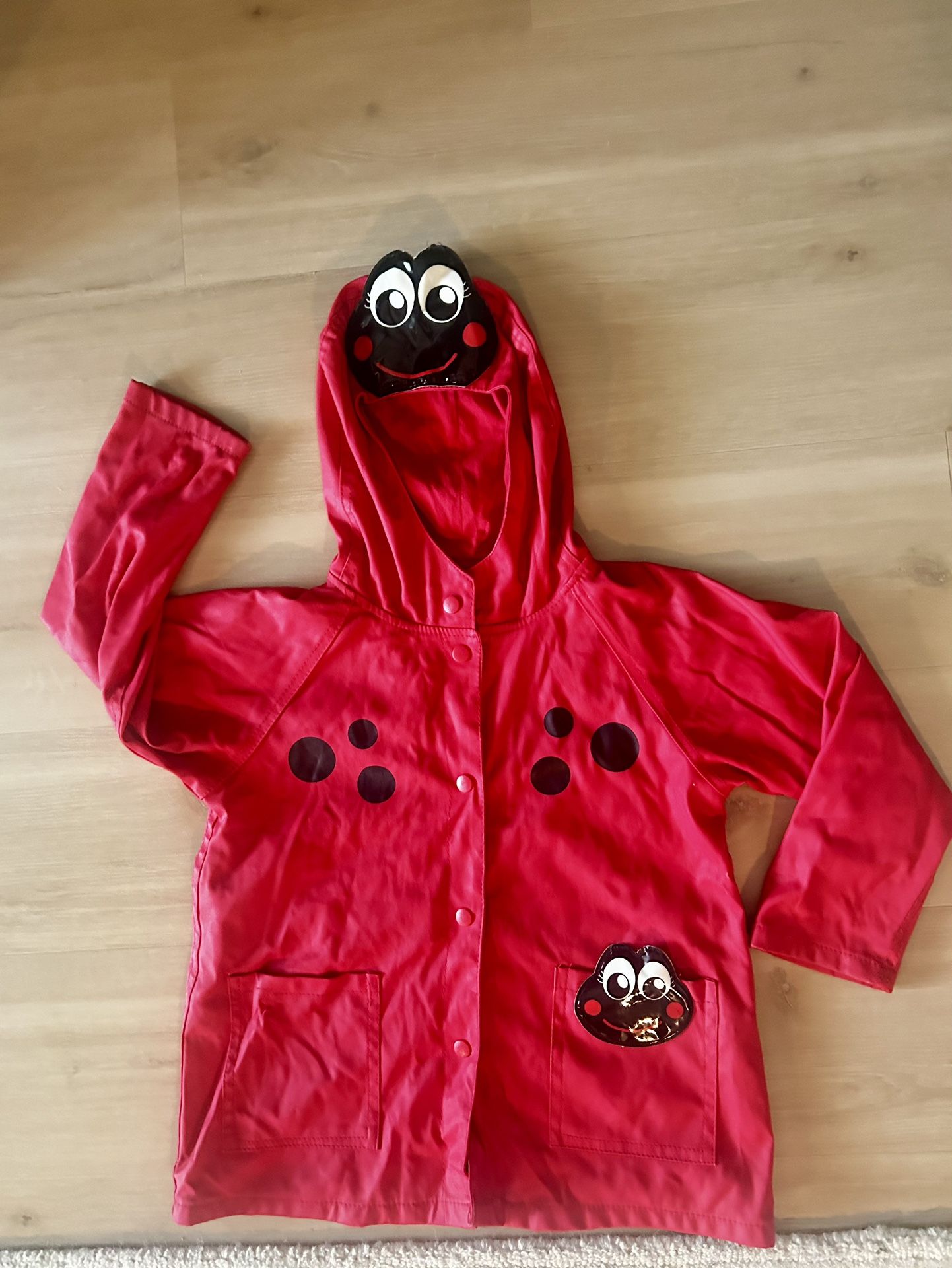 $12 Western Chief Ladybug Raincoat – size 6