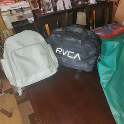 DUAL TOP OF THE LINE DUFFEL BAG AND BOOK BAG. 