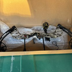 Compound Bow With A High Dollar Sight 