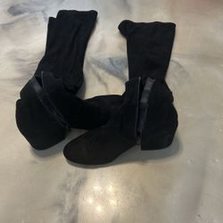 Black suede knee-high boots