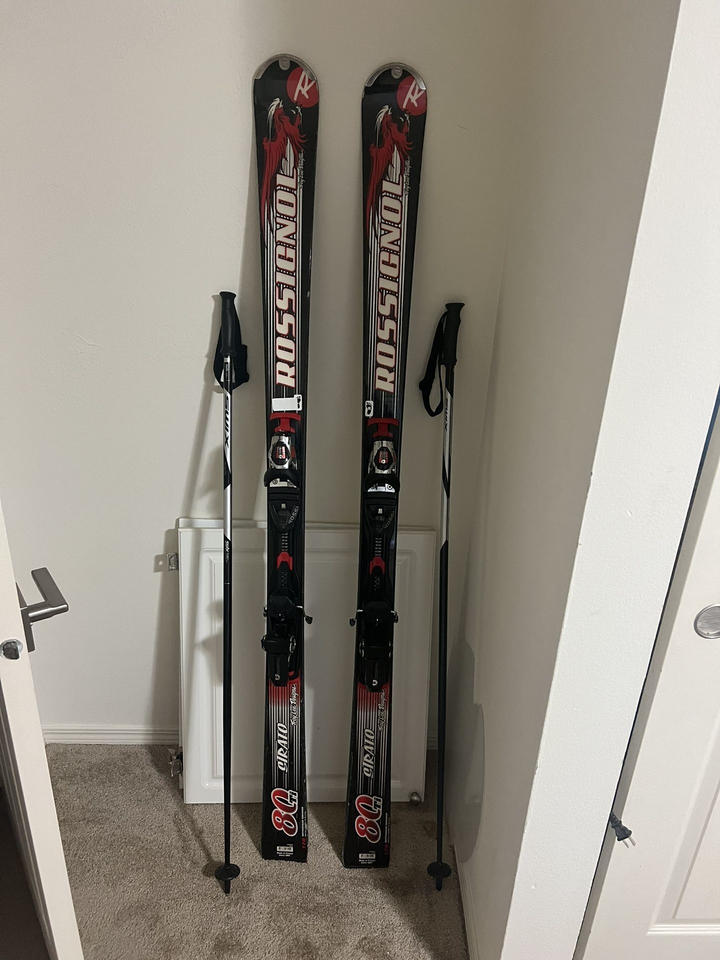 Rossignol 68”Skis And Poles-good Shape