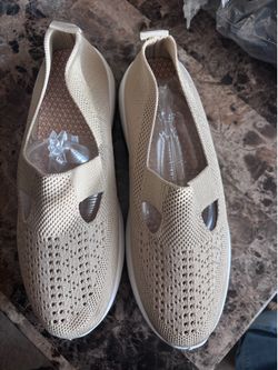 Beige slip on shoes