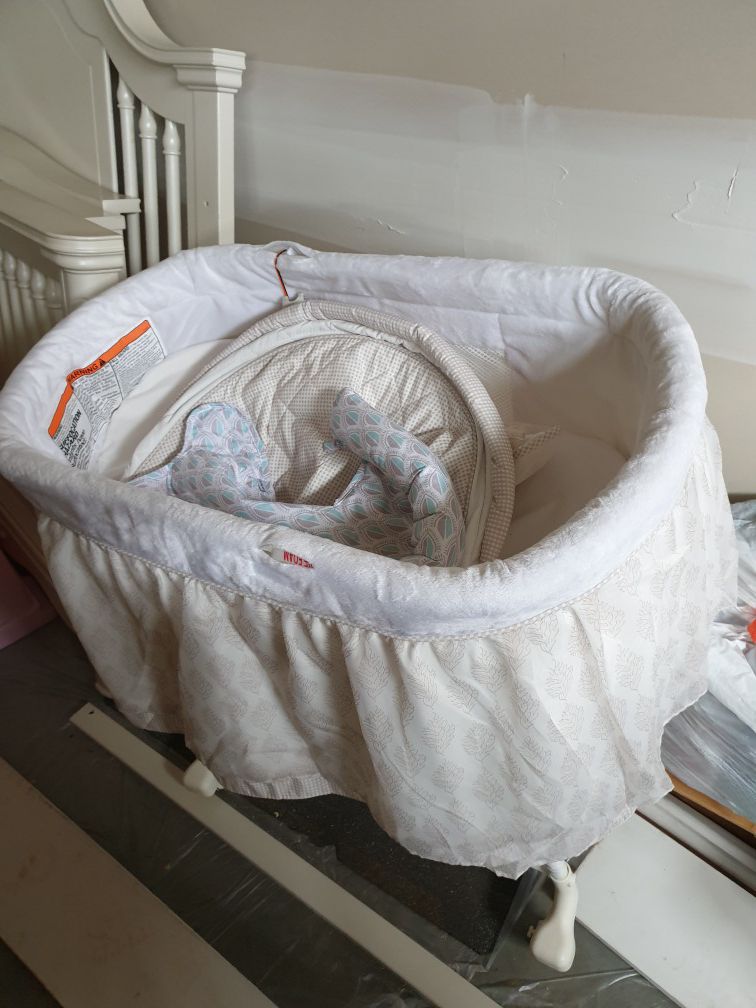 Free,Slightly used bassinet,cosleeper,brand new bath tuband used dining glass table with 4 chairs, smoke and pet free home,.