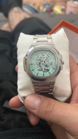 Wove teal and silver watch