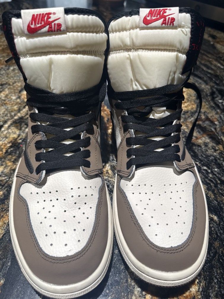 This is a Nike Air Jordan 1 Retro High OG SP Travis Scott in the Dark Mocha colorway