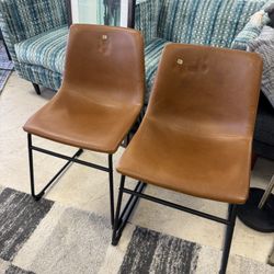 Pair Of Faux Leather Armless Dining Chairs. 