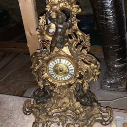 french guilt bronze and patinated bronze rococo figural shelf clock cherubs 28” high