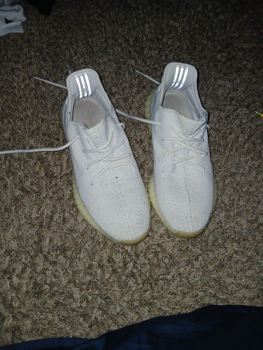 Size 12  Adidas Yeezy Boost 350 V2 in the "Triple White" colorway. 