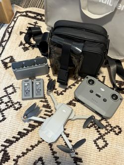 DJI Mini 2 Fly More Combo – Great Condition (Minor Gimbal Mount Damage)
