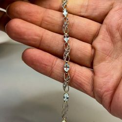 Lovely Women's Silver Topaz Bracelet, 8 Beautiful Blue Stones, 7 1/2"