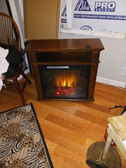 Indoor Heater Iike New With Remote. Looks And Feels Like A Real Fireplace. Puts Out Great Heat.low Med. And High.30x30x11.5
