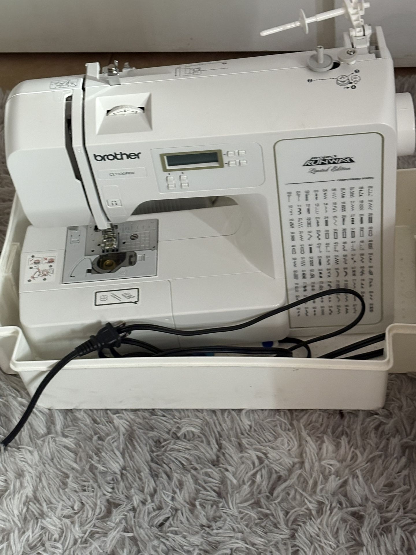 Brother Project Runway CE1125PRW Computerized 100-Stitch Sewing Machine Clothes