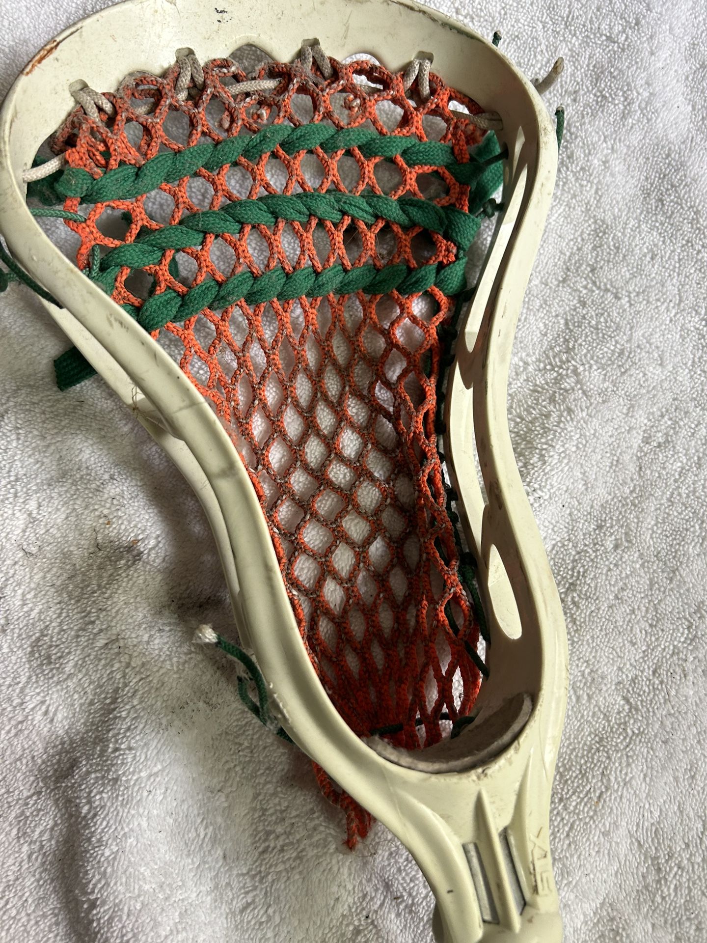 Lacrosse LAX stick Warrior Platinum Alloy midfielder pole with STX EVO 1 head.