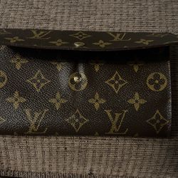 LV long monogram wallet with serial number 