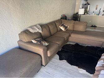 Brown couch with ottoman