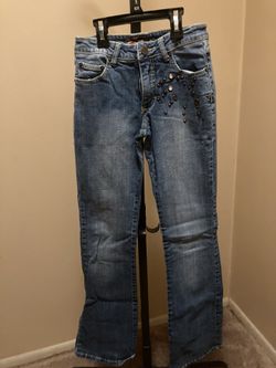 Size 0 boot cut blue jeans with rhinestones