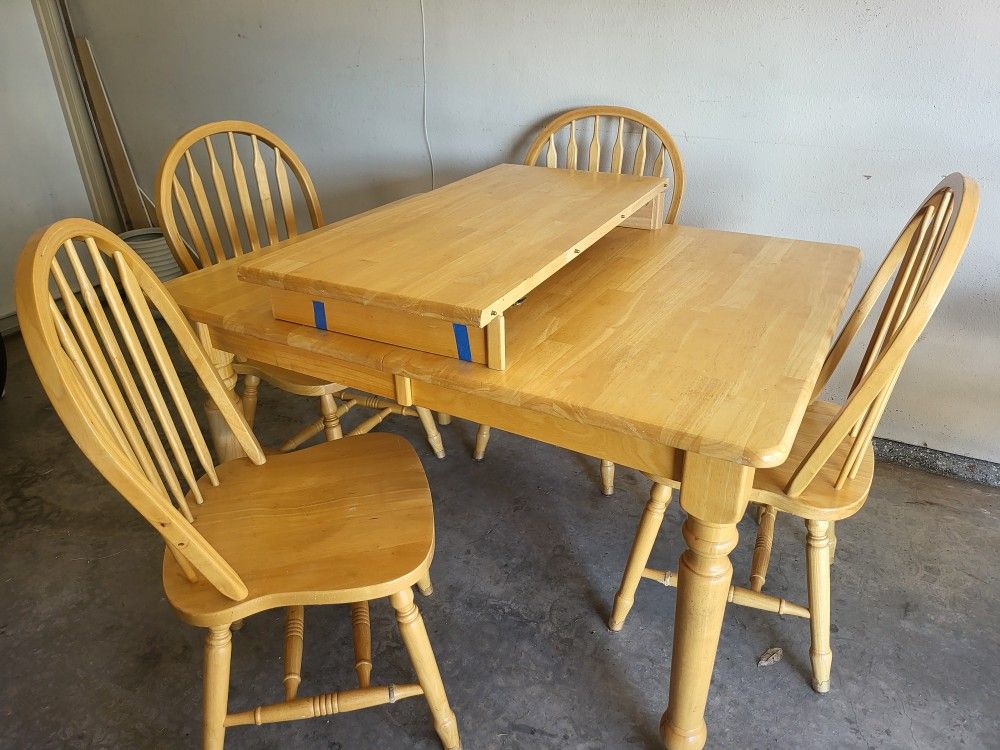 Dining Table with 4 chairs and an extension