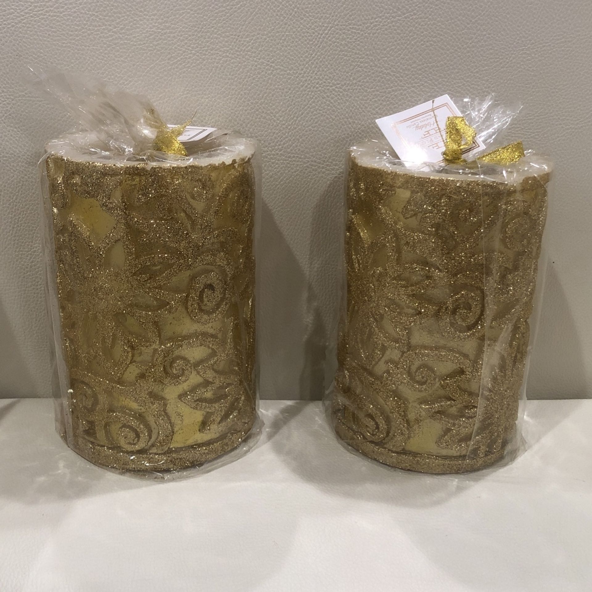 Fitz and Floyd Holidays Gold Sparkling Pillar Candles.