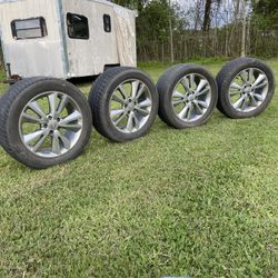 4 Tires And Wheels Excellent Condition  All Are 20 “ Jeep Wheels 