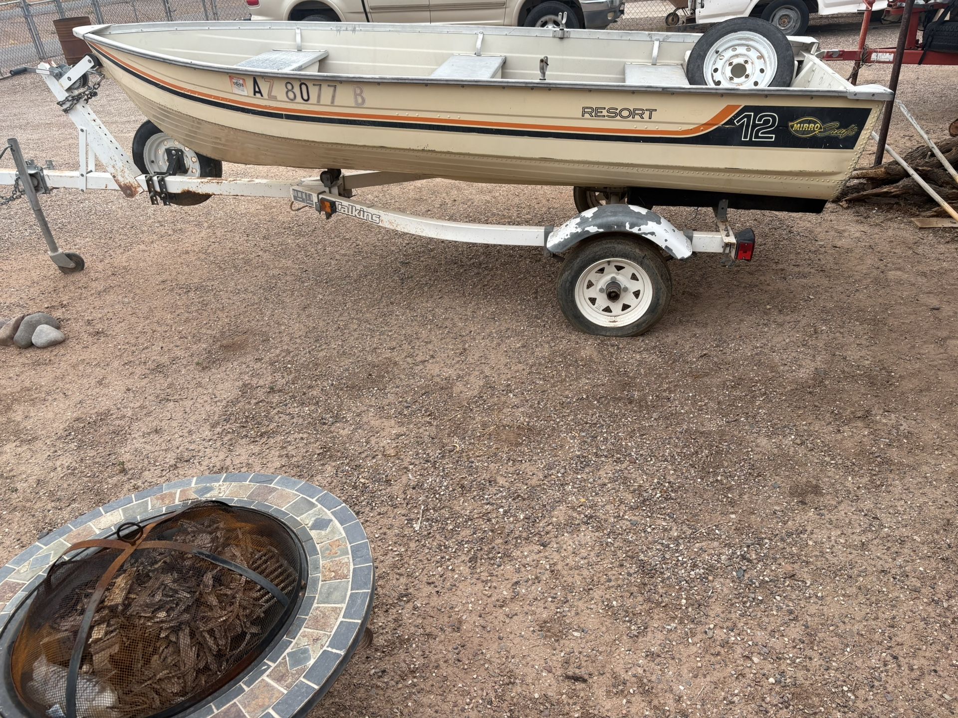 Boat And Trailer And Trolling Motor