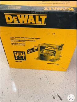 DEWALT DW734 12-1/2-inch Heavy-Duty Portable Thickness Planer.