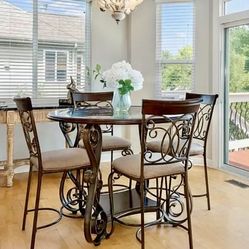 Round Glass Table with Four Chairs