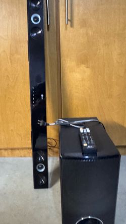 LG SOUNDBAR AND SUBWOOFER