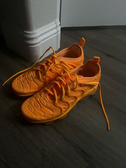 Nike orange shoe