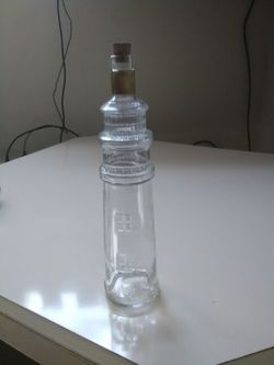 Vintage light house bottle with cork