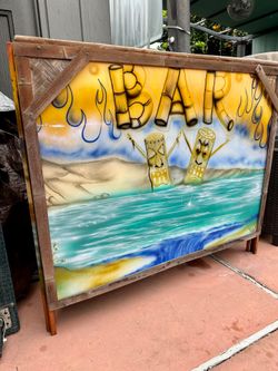 Tiki bar with storage shelf