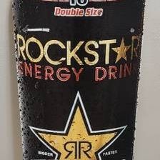 Double-sided cardboard Rockstar Energy Drink sign