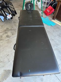 Massage table