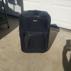 Suitcase On Wheels And With Duffle Bag 