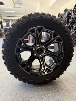 Wheel tire package deal on sale Fuel dark tint 20x9 6x139.7 with 33” aggressive tires Chevy gmc ram financing available