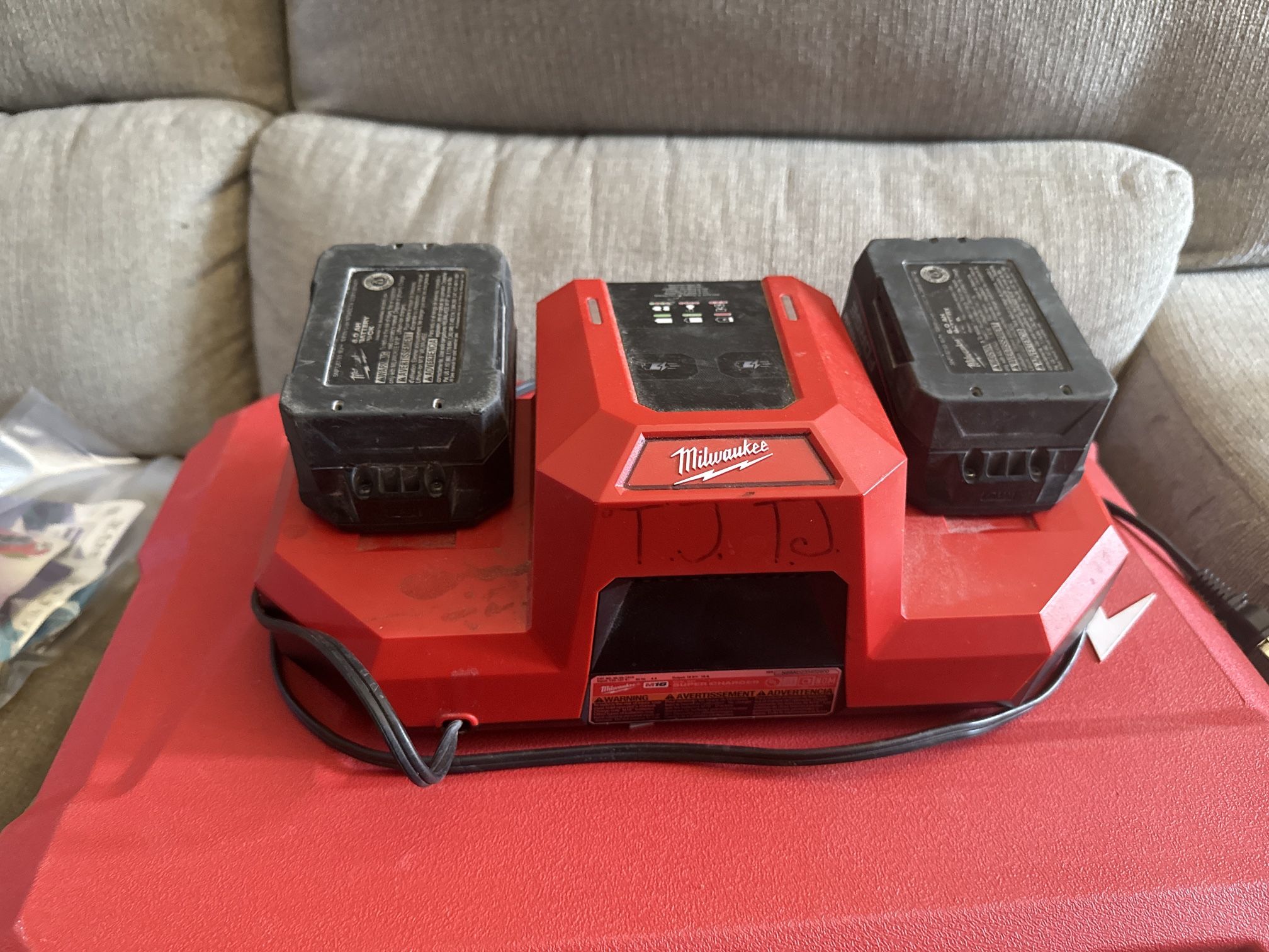 Milwaukee fast charger with two Fords batteries 6.0