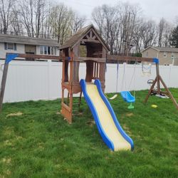 Back yard wooden swing set