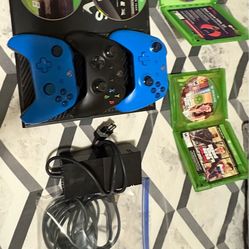 xbox one with 3 controllers and 4 games and all cables