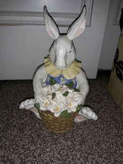 Adorable rabbit with flowers figurine