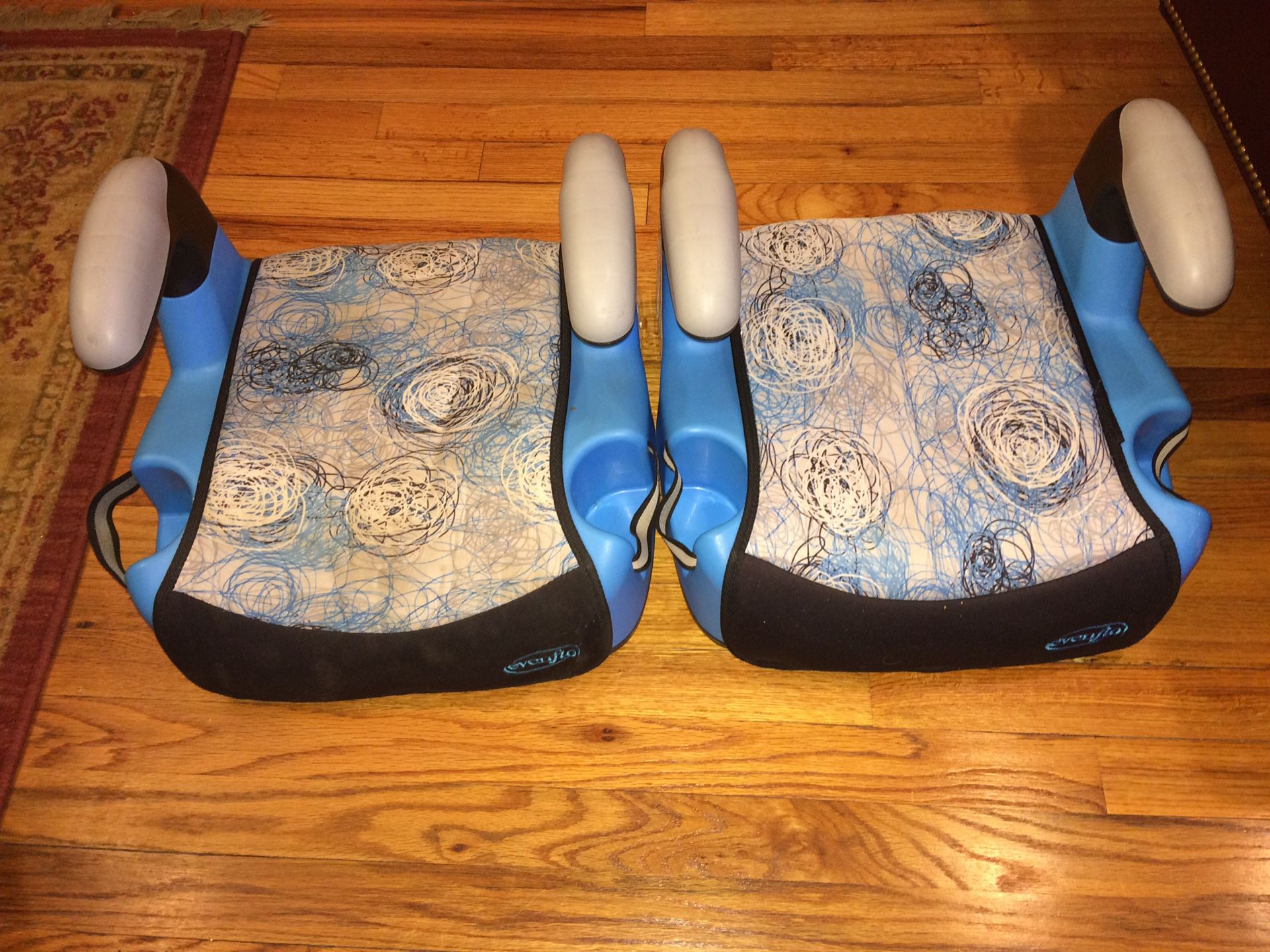 Two Evenflo Booster Car Seats